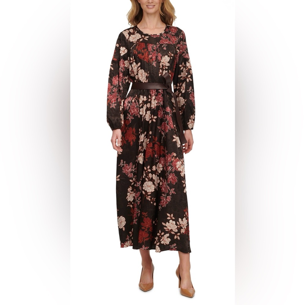 Calvin Klein's maxi dress arrives in a rich floral print with a faux-leather